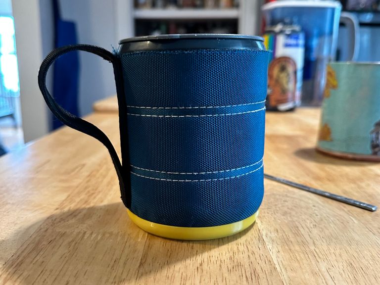 The same mug set down on a kitchen island.